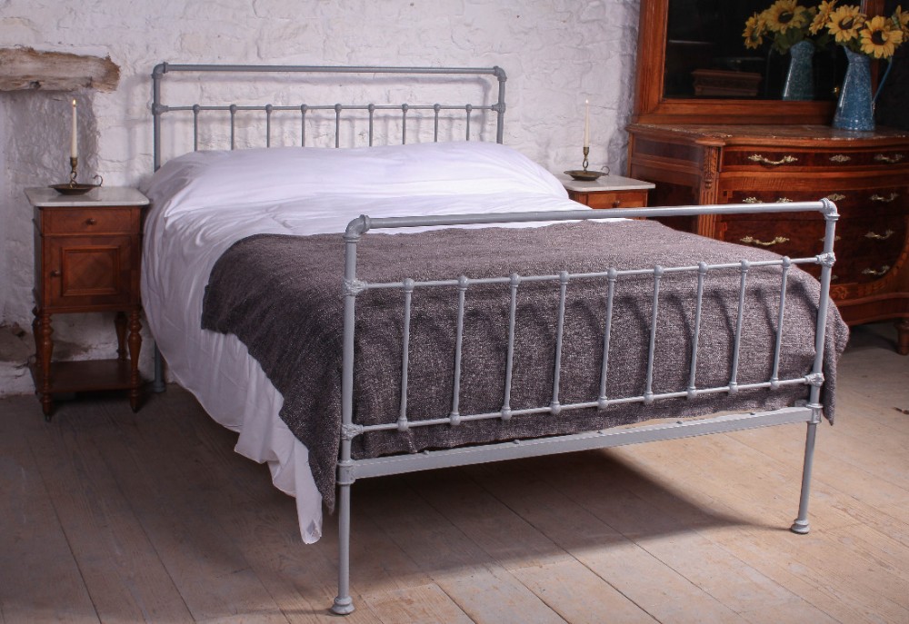 Simple king size all iron Victorian bed in mid lead grey.
