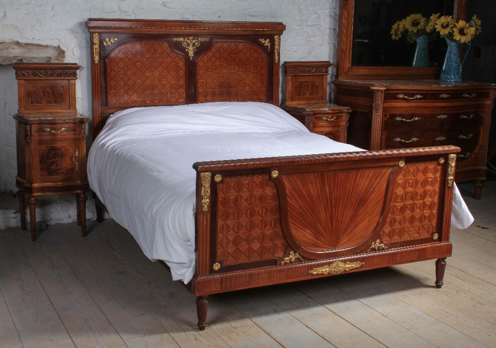 Striking kingsize French fruit wood with bronze mounts bed