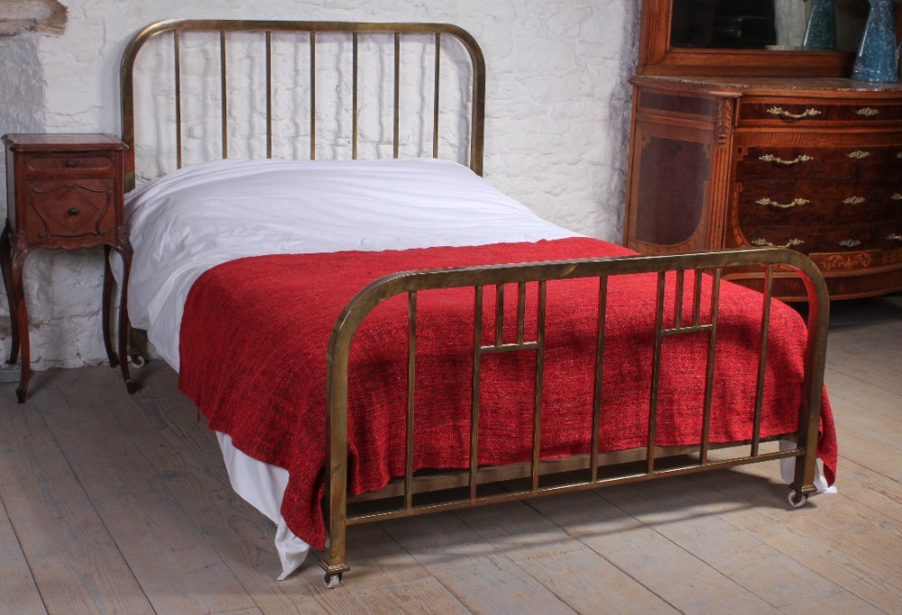 Simple aged brass Art Deco double bed