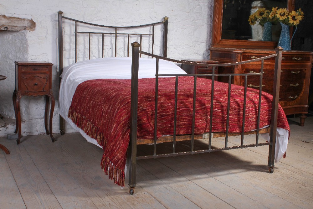 Aged brass Edwardian dip rail double bed