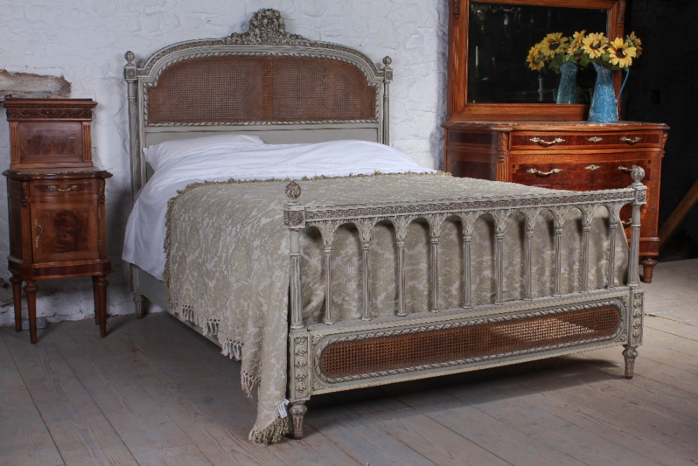 Beautiful French painted carved caned king size bed