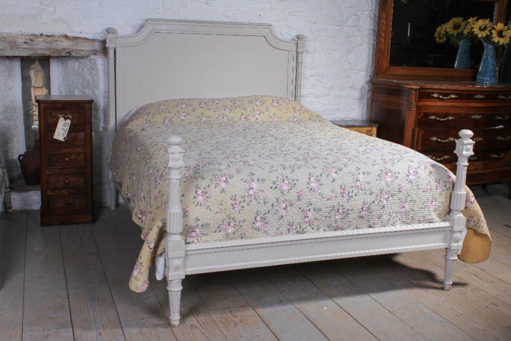 Lovely carved painted low end French king size bed
