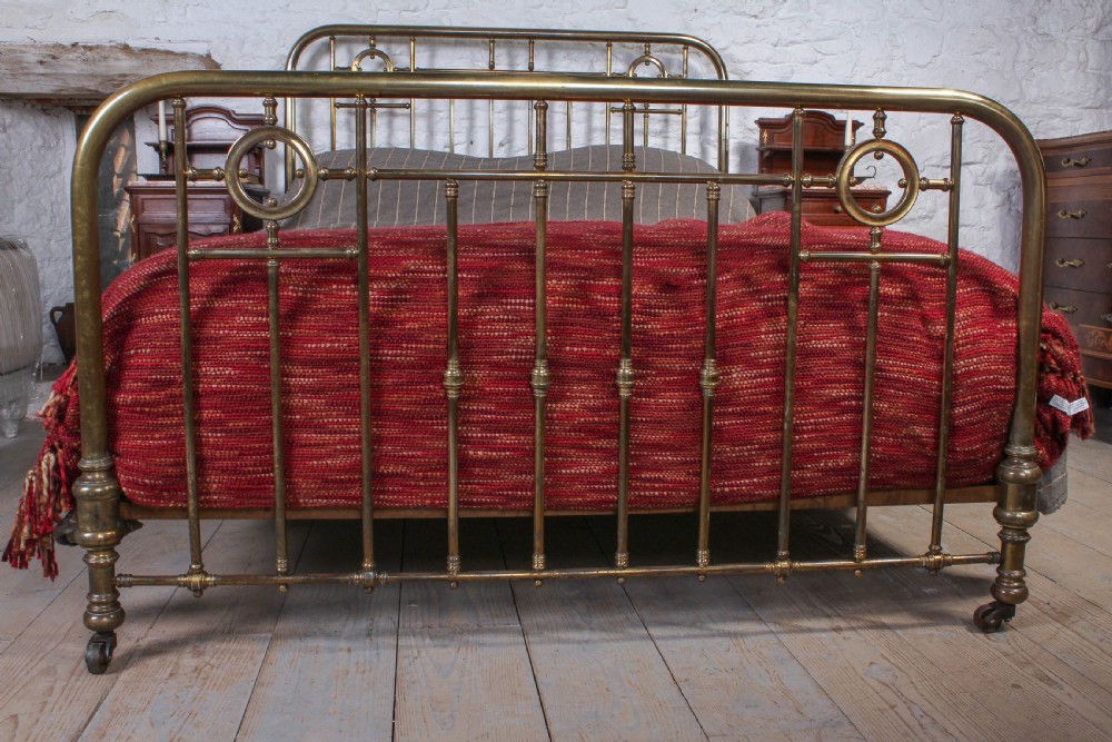 Lovely naturally aged individual and simple brass French king size bed with brass ring detail View VIII