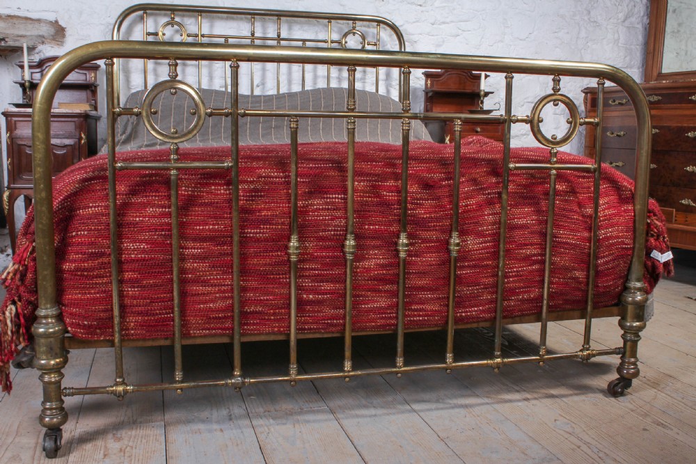 Lovely naturally aged individual and simple brass French king size bed with brass ring detail View IX