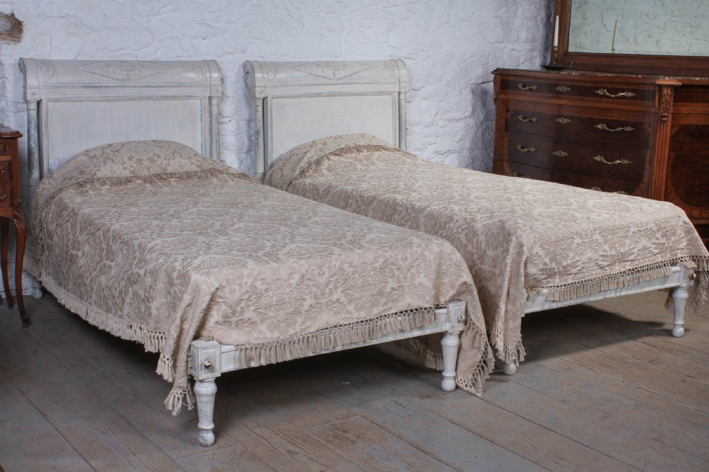 Pair of Directoire style single low end beds