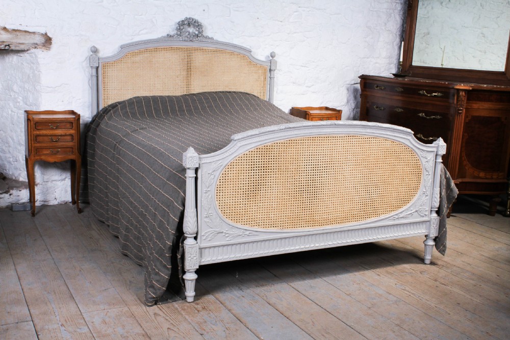 Pretty French carved painted caned Louis XVI style Bergere king size bed