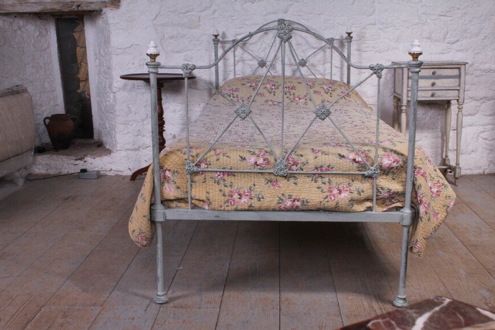 Pretty hand finished single iron bed with porcelain knobs View II