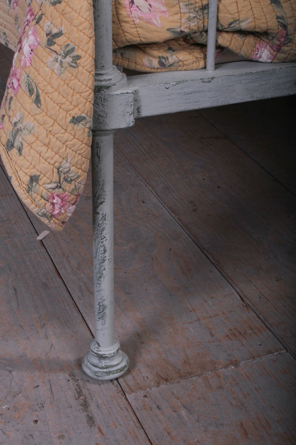 Pretty hand finished single iron bed with porcelain knobs View IV