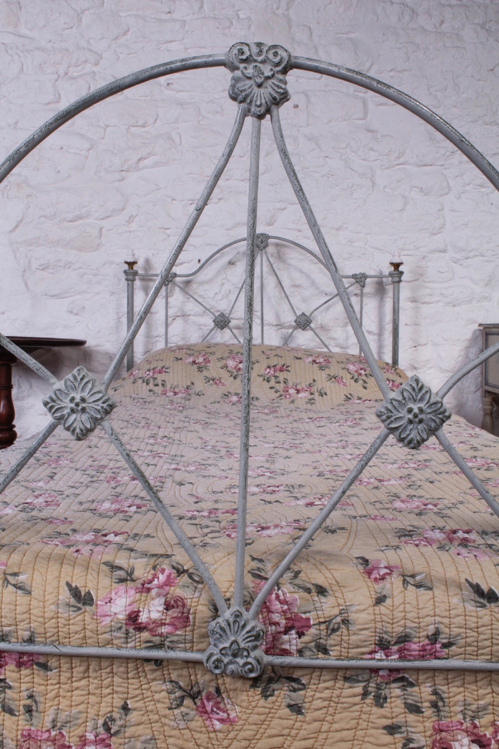 Pretty hand finished single iron bed with porcelain knobs View V