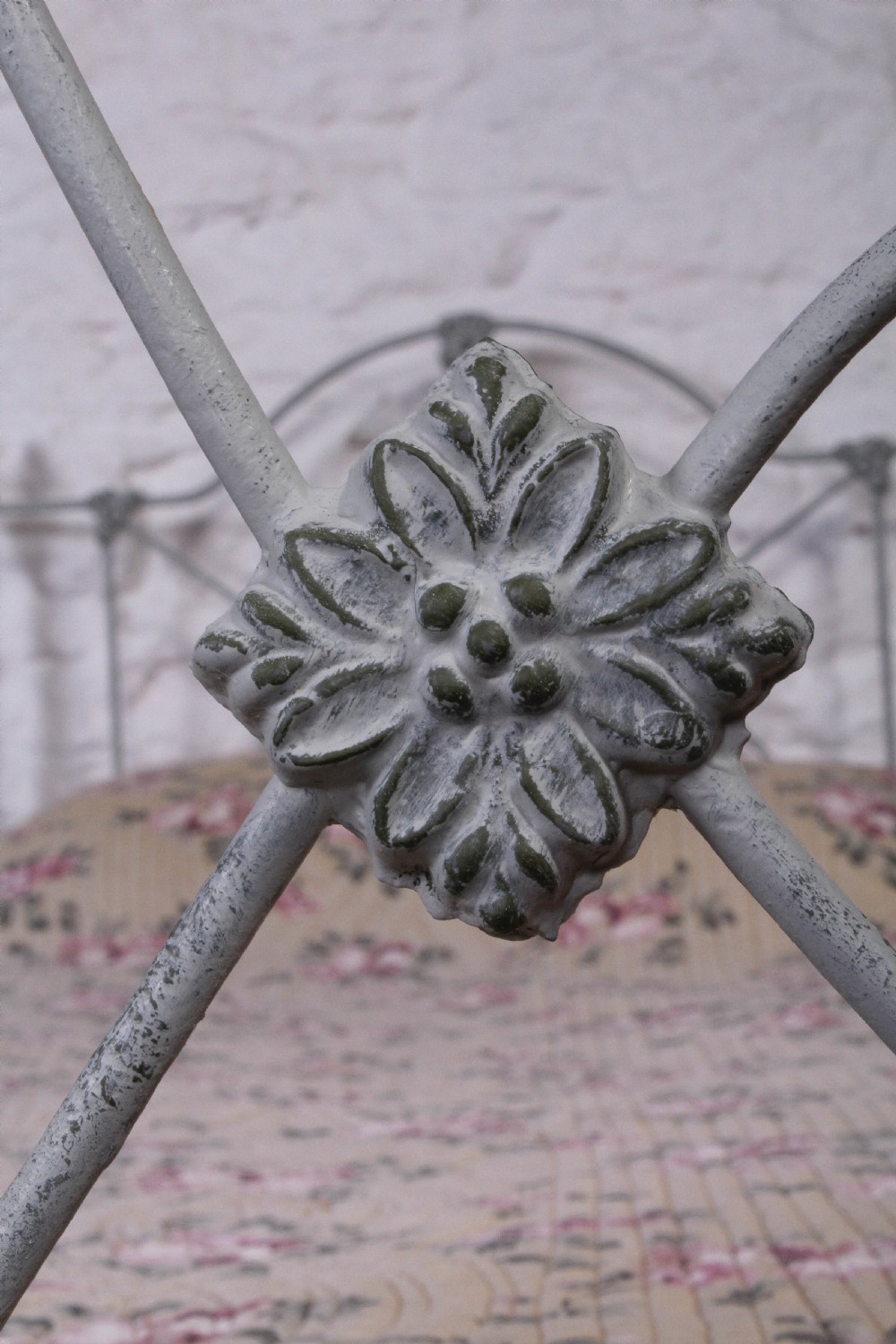 Pretty hand finished single iron bed with porcelain knobs View VI