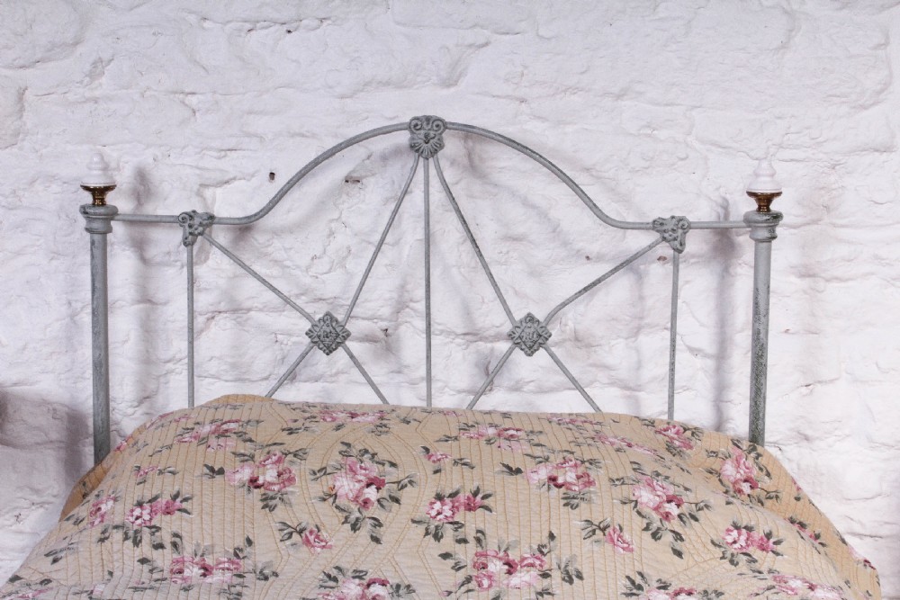 Pretty hand finished single iron bed with porcelain knobs View VIII