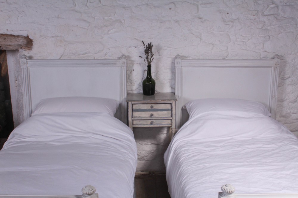 Pair of single French empire style painted beds View II