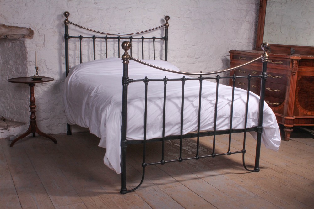 Classic Victorian dip rail black and brass double bed