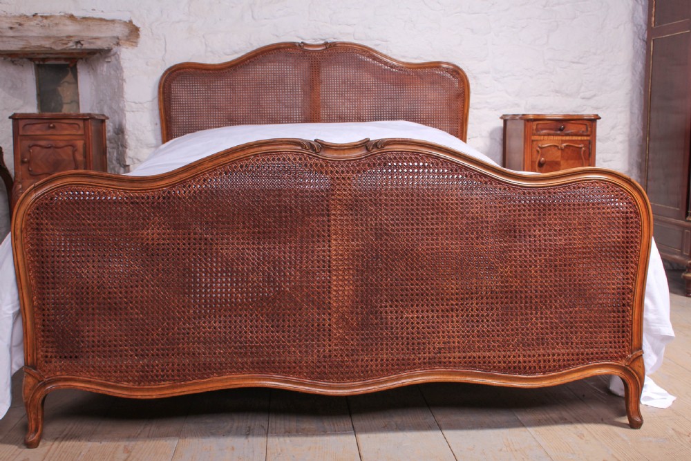Attractive French Louis XV style caned bergere king size bed View III