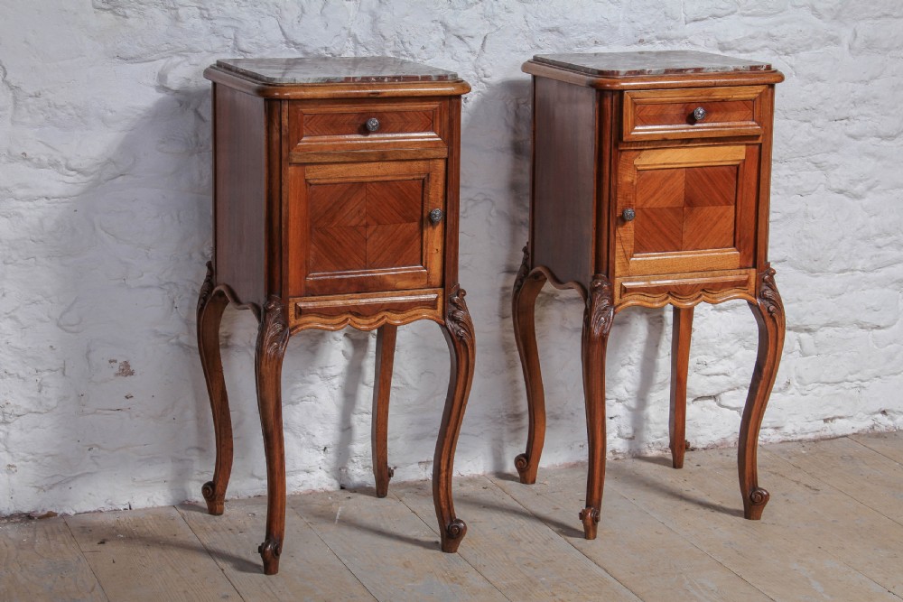 Pair of walnut Louis XV style bedsides with rose marble tops