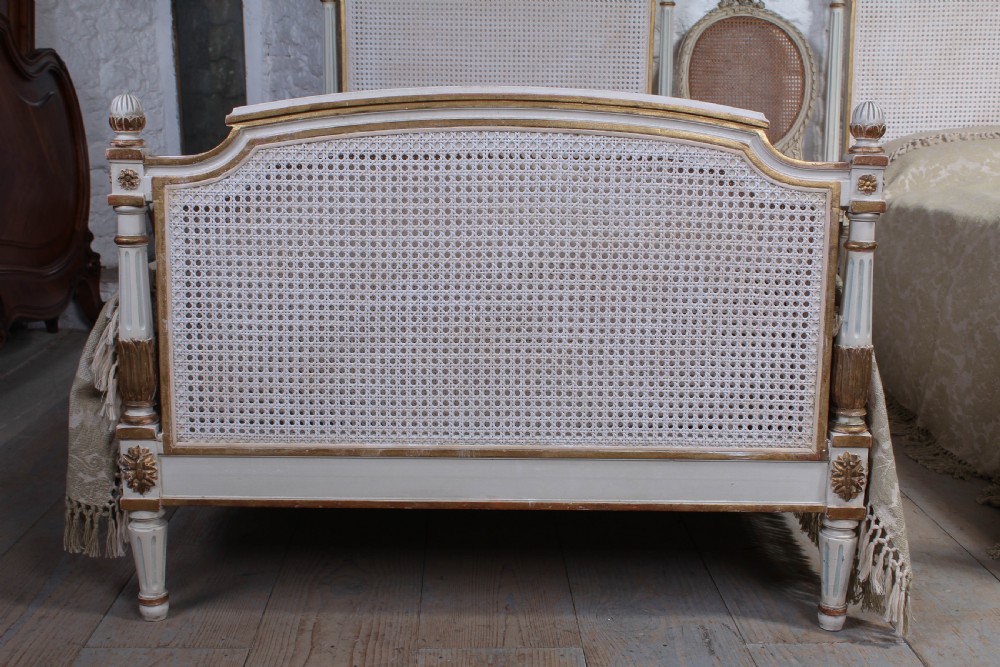 Very pretty pair of French painted caned bergere beds View III