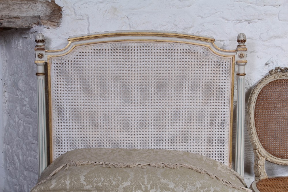 Very pretty pair of French painted caned bergere beds View V