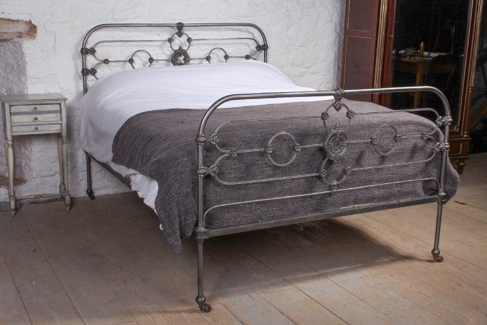 Beautiful burnished all iron king size early Victorian bed