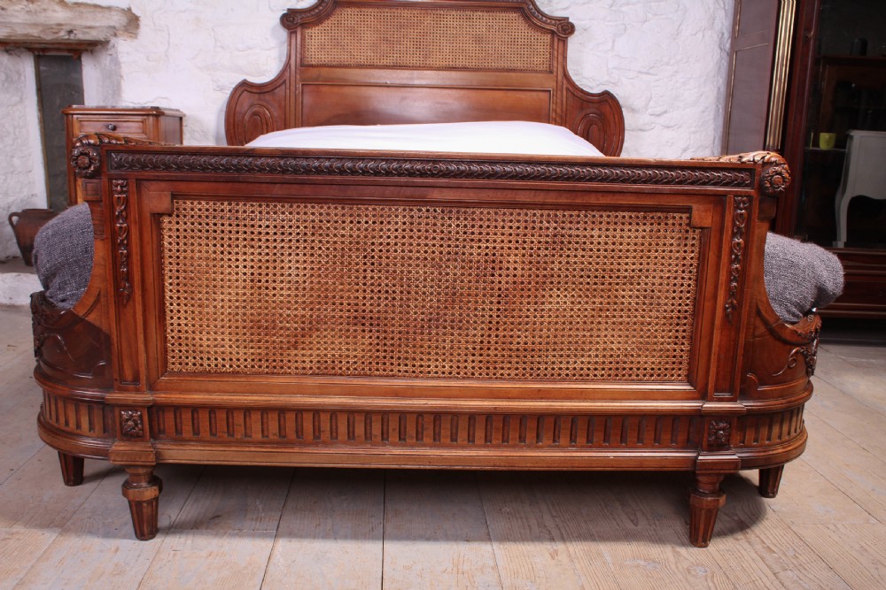 Handsome rare carved walnut and Bergere caned 5Ft French king size bed  View II
