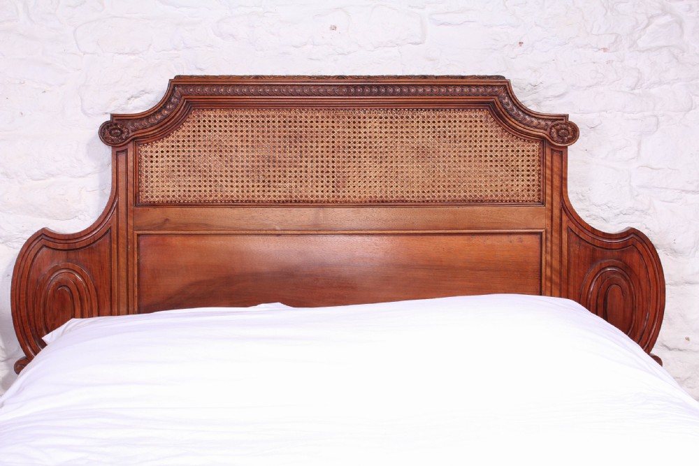 Handsome rare carved walnut and Bergere caned 5Ft French king size bed  View VII