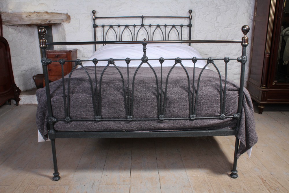 Rare and individual Victorian black and brass double bed. View II