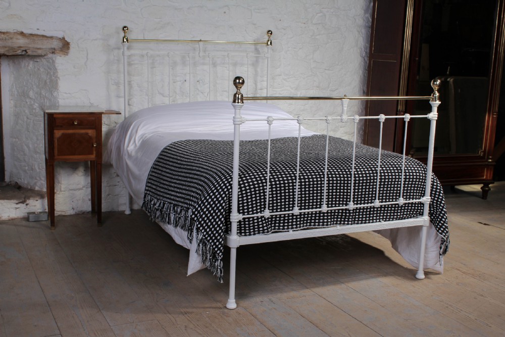 Pretty three quarter queen size Victorian brass and iron bed