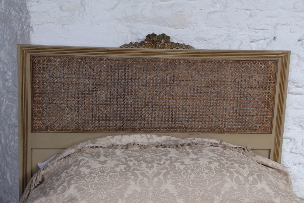 Pretty pair of French meter wide caned gilded beds View III