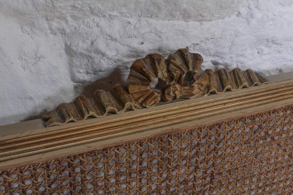Pretty pair of French meter wide caned gilded beds View IX