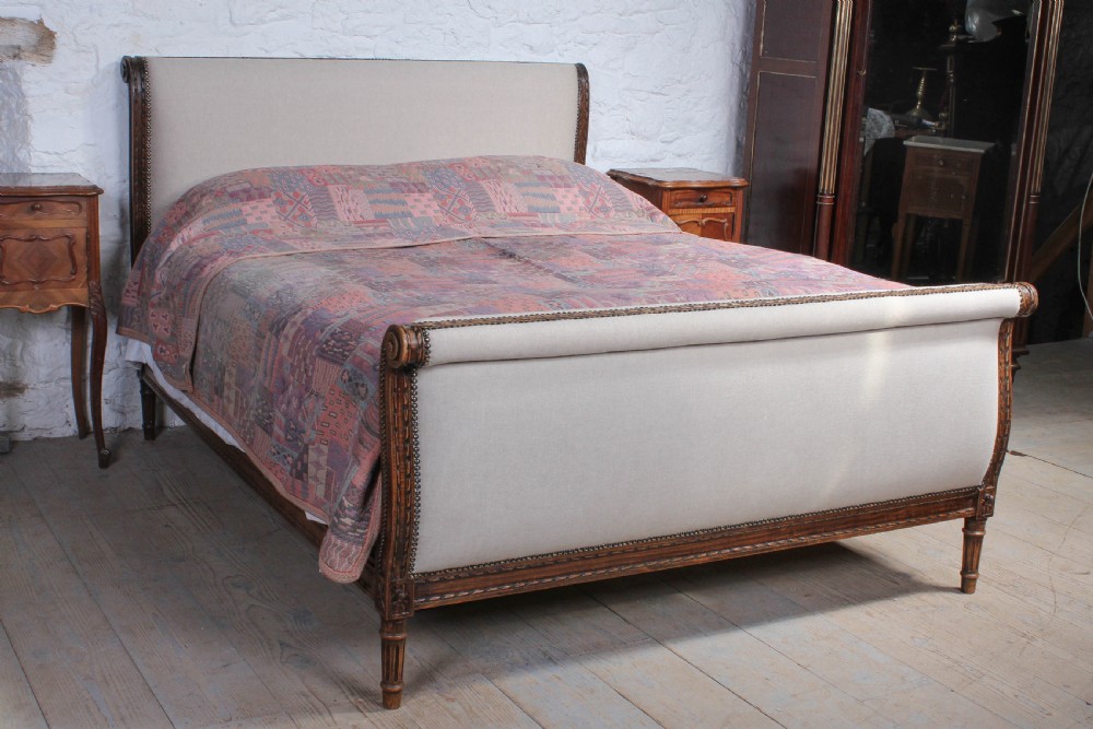 Elegant French oak upholstered king size sleigh bed