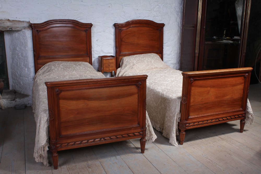 Handsome pair of French Walnut single beds