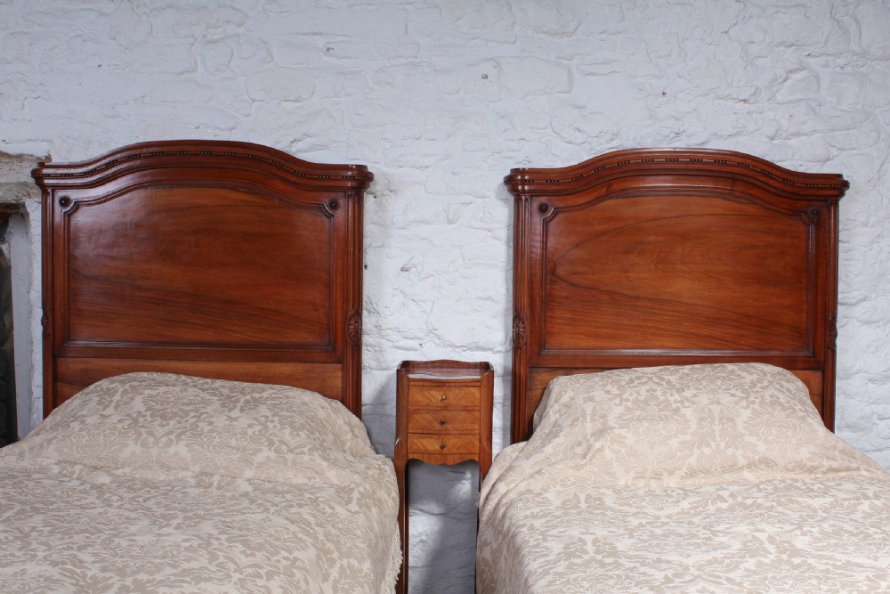 Handsome pair of French Walnut single beds View V