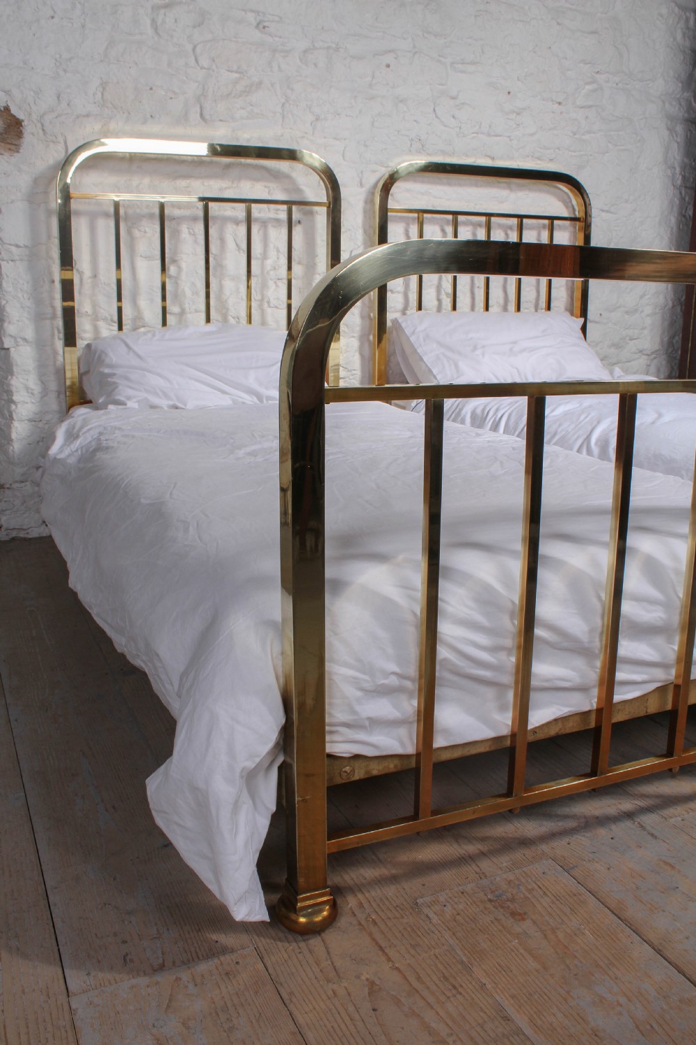Attractive pair of simple French all brass single beds View V