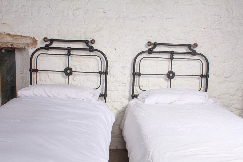 Attractive Pair of no end single beds View II