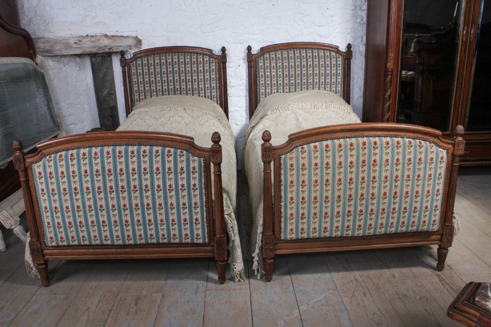 Pair of French carved oak upholstered single beds View VI