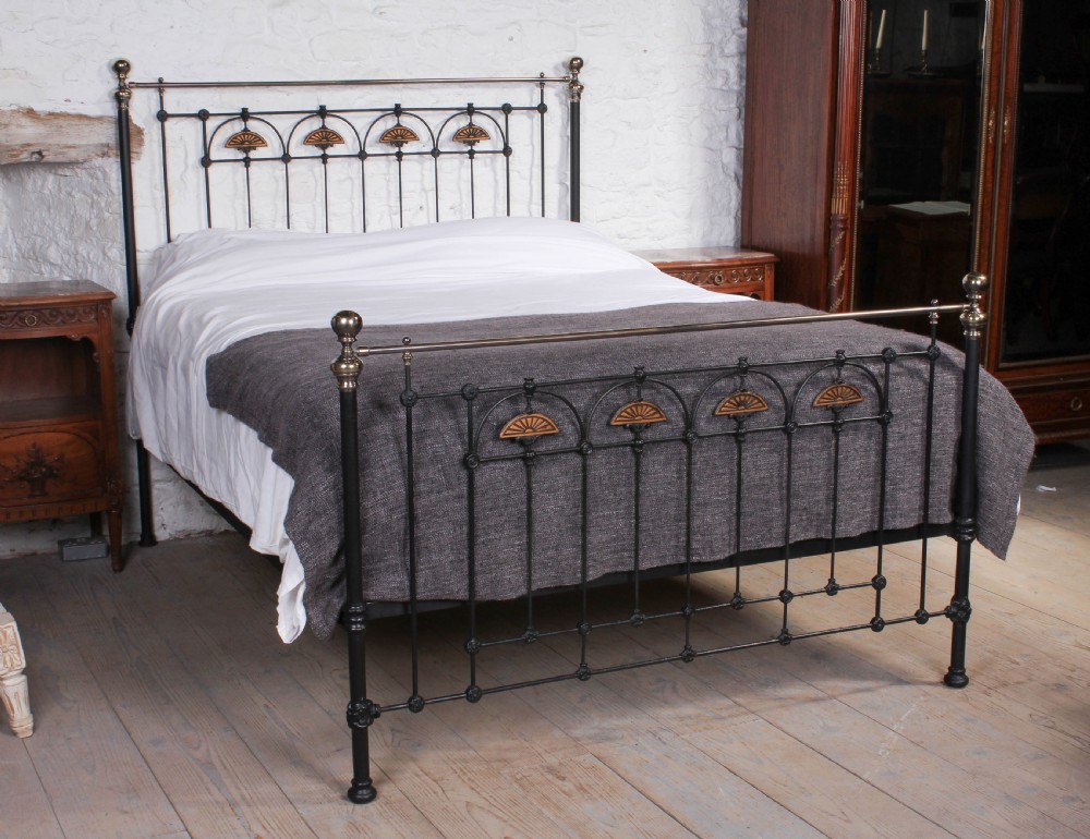 Pretty and individual king size brass and iron bed