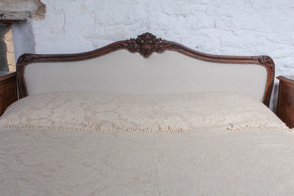 Carved oak frame newly upholstered European king size bed View IV