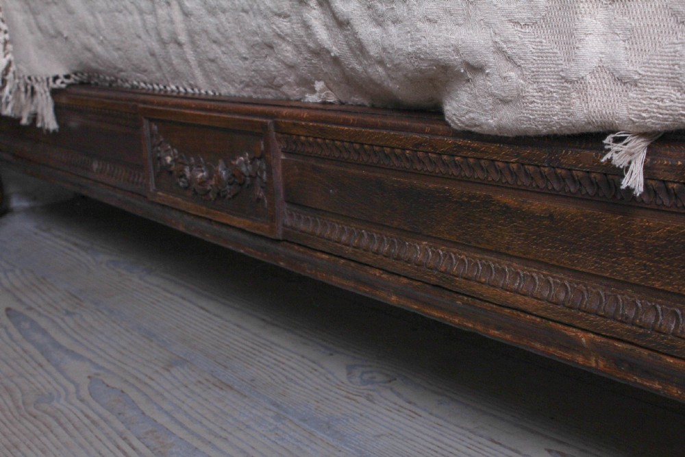 Carved oak frame newly upholstered European king size bed View IX