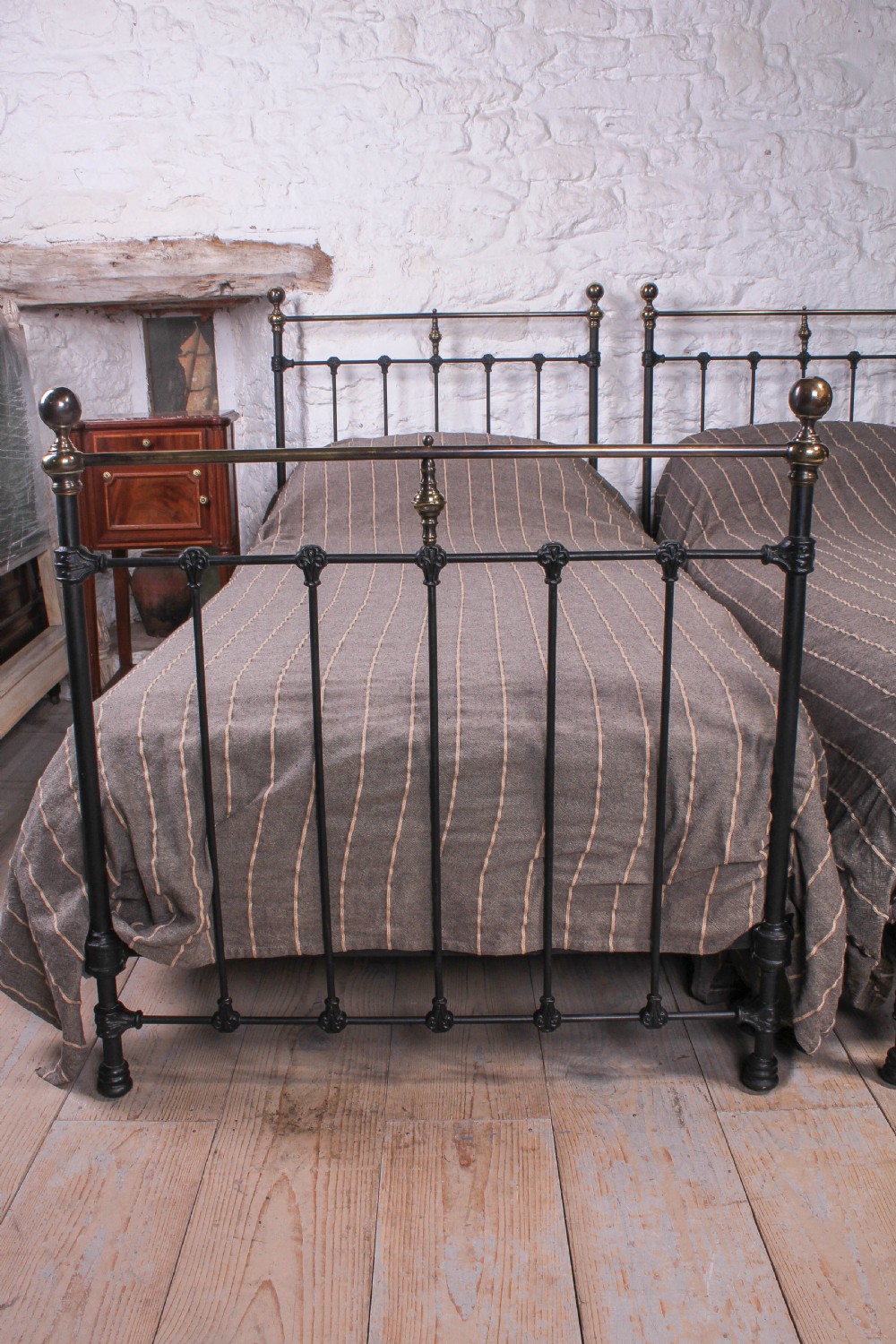 Lovely pair of black and aged brass single beds View III
