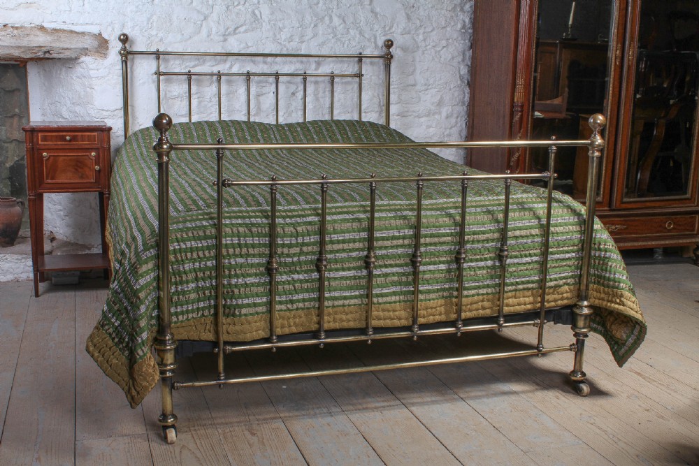 Elegant Victorian aged brass king size bed