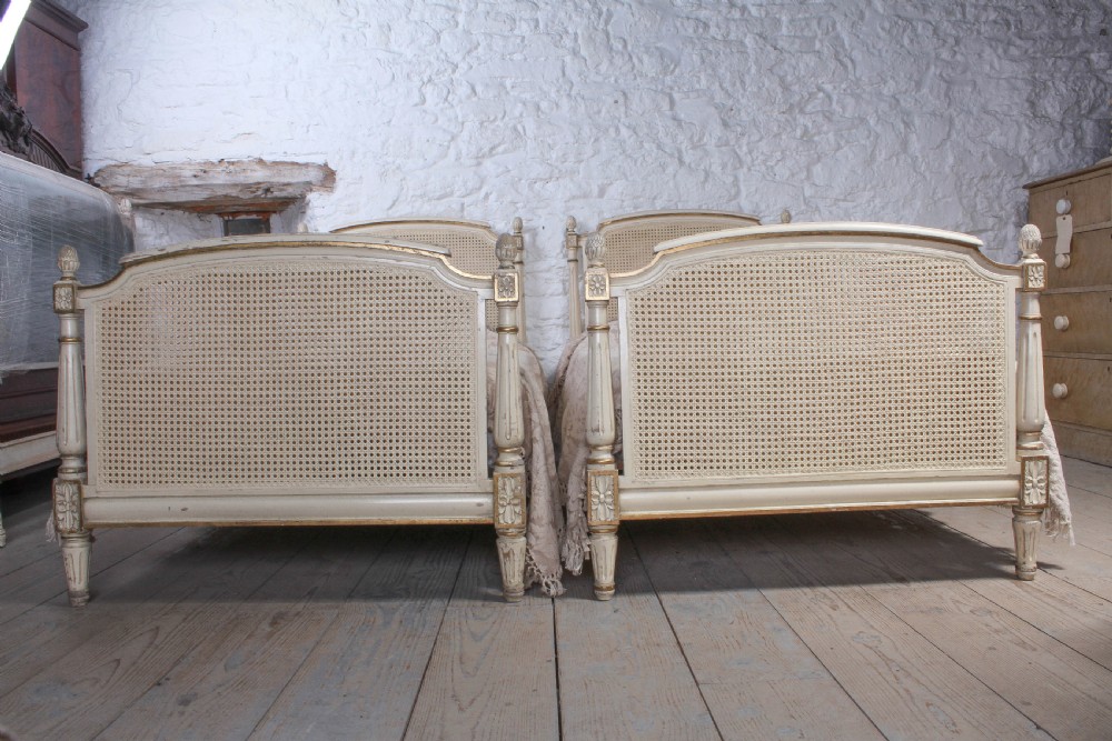 Attractive pair of French caned beds View II