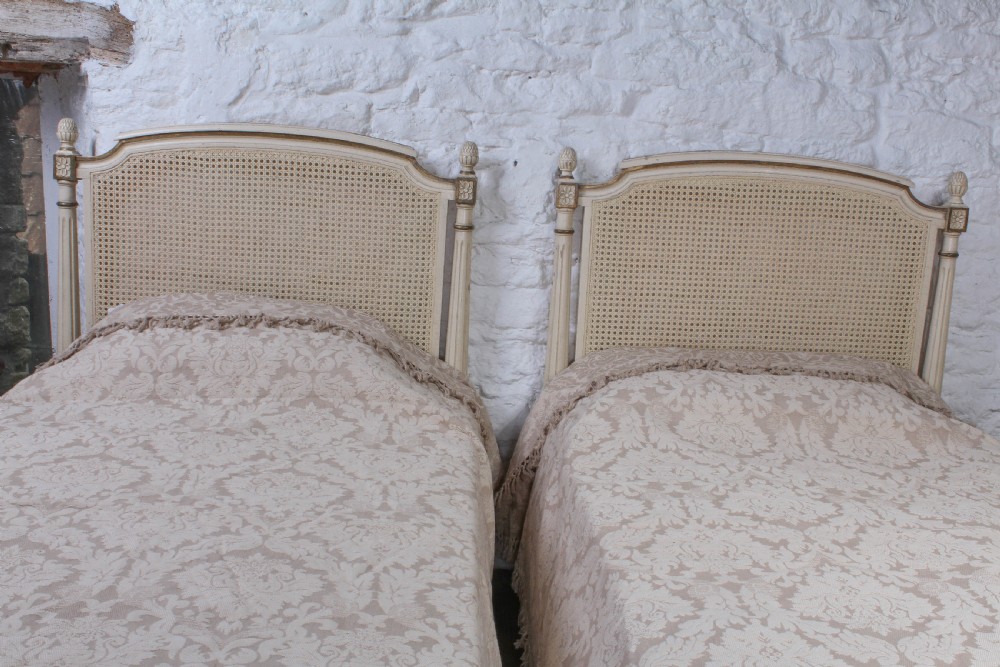 Attractive pair of French caned beds View V