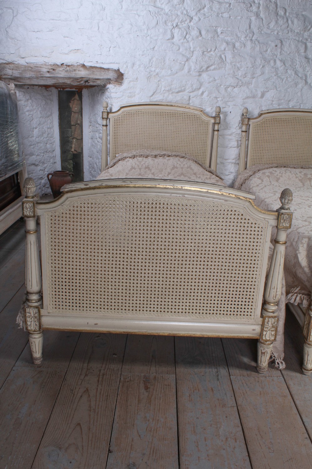 Attractive pair of French caned beds View VII