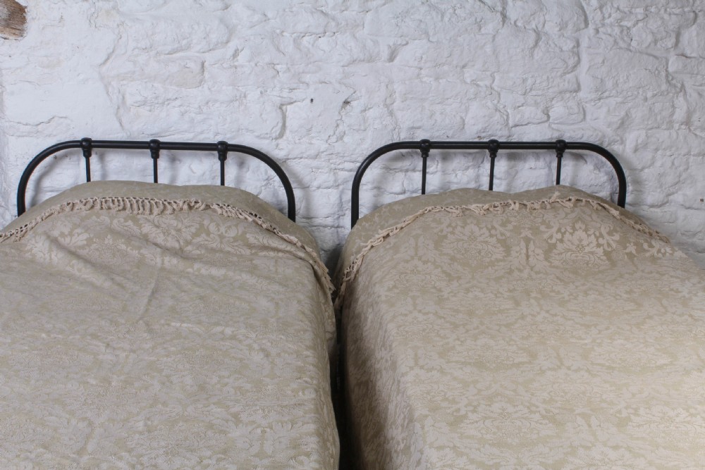 Almost pair of dorm style all iron Victorian single beds View VII