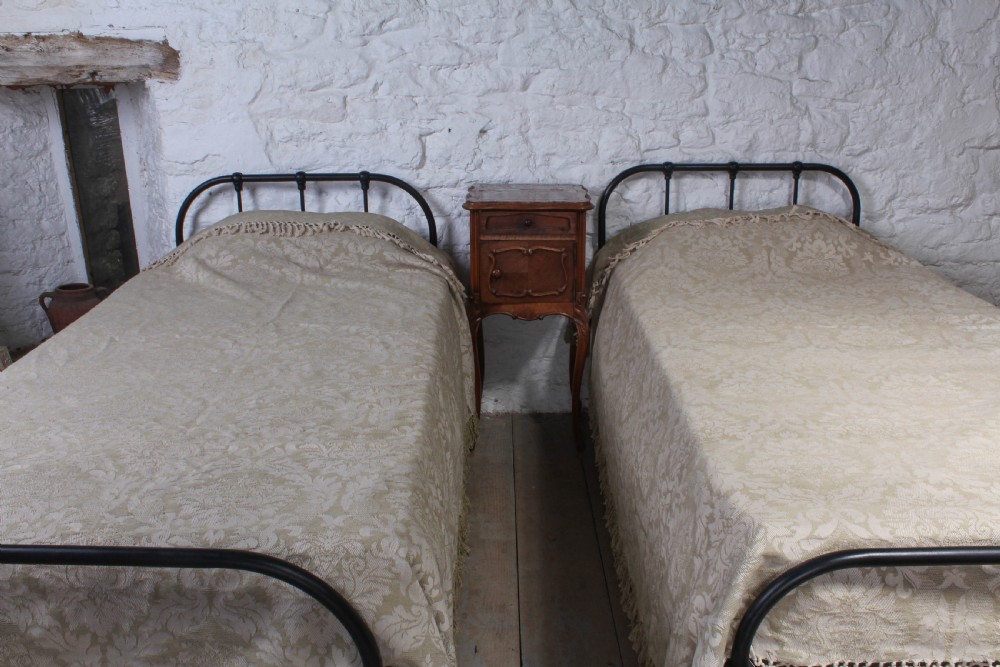 Almost pair of dorm style all iron Victorian single beds View VIII