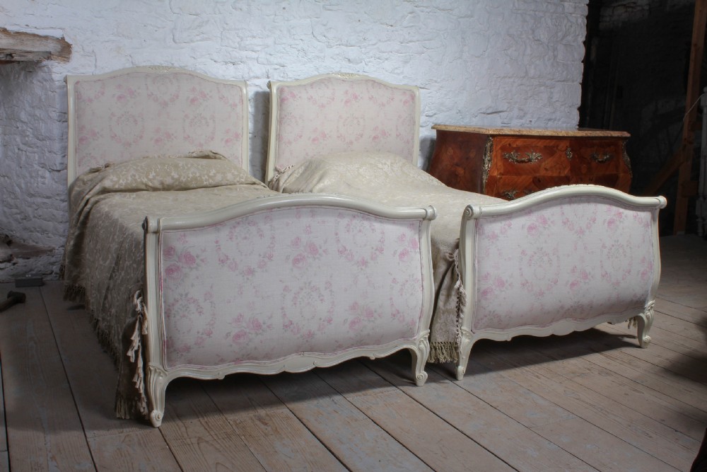 Pair of pretty French upholstered single beds