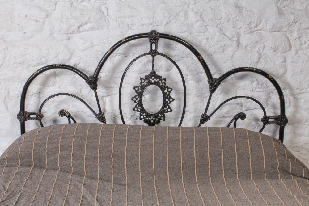 All original iron three hoop double bed with floral detail View III