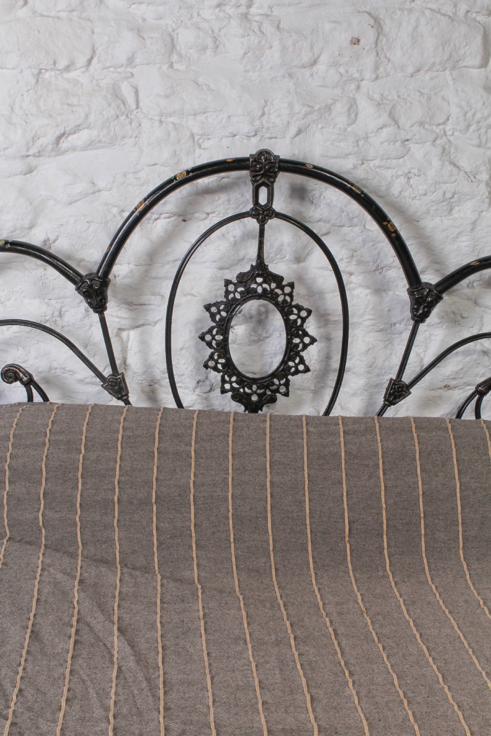 All original iron three hoop double bed with floral detail View V