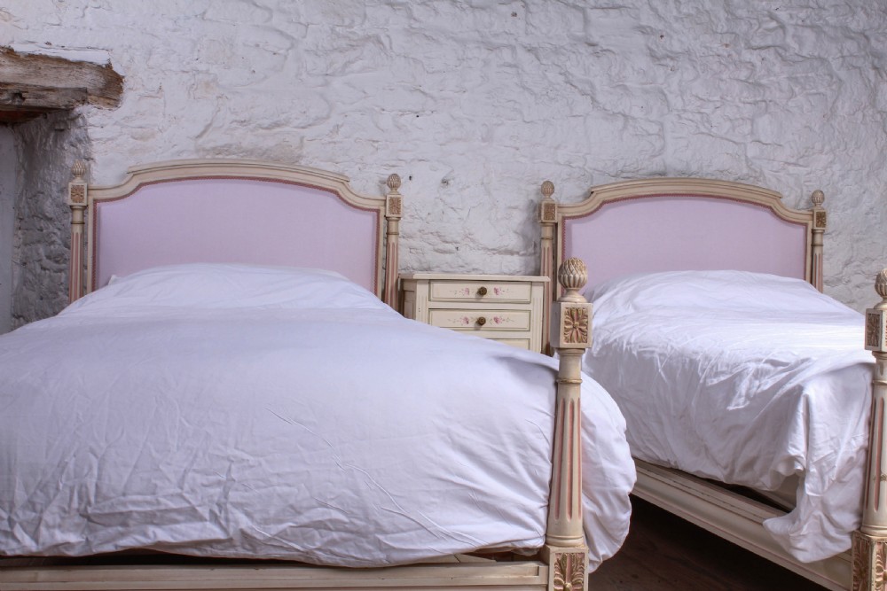 Pretty in pink pair of French newly upholstered single beds View VIII
