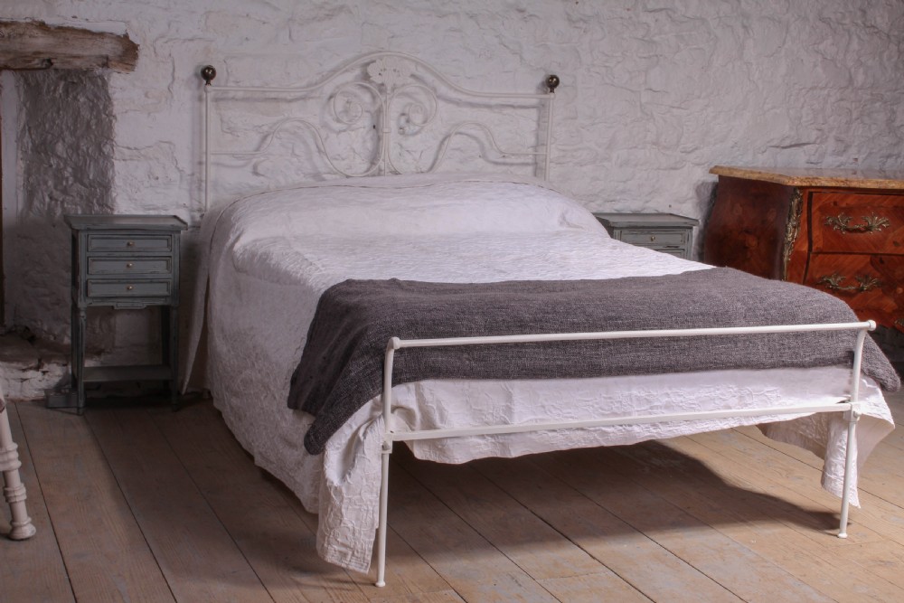 Pretty forged iron low end bed
