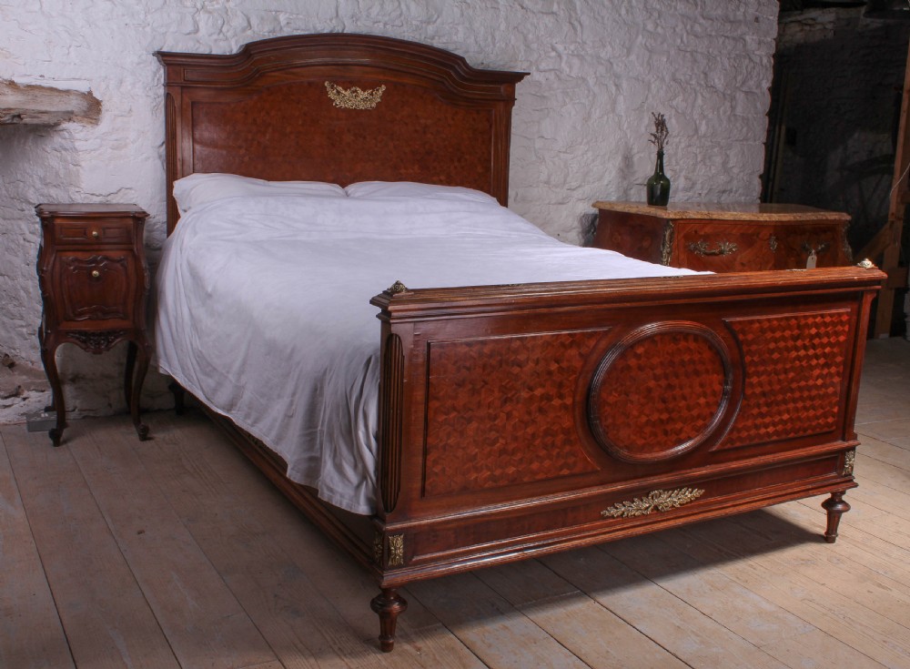 Magnificent Mahogany and fruit wood parquetry king size bed